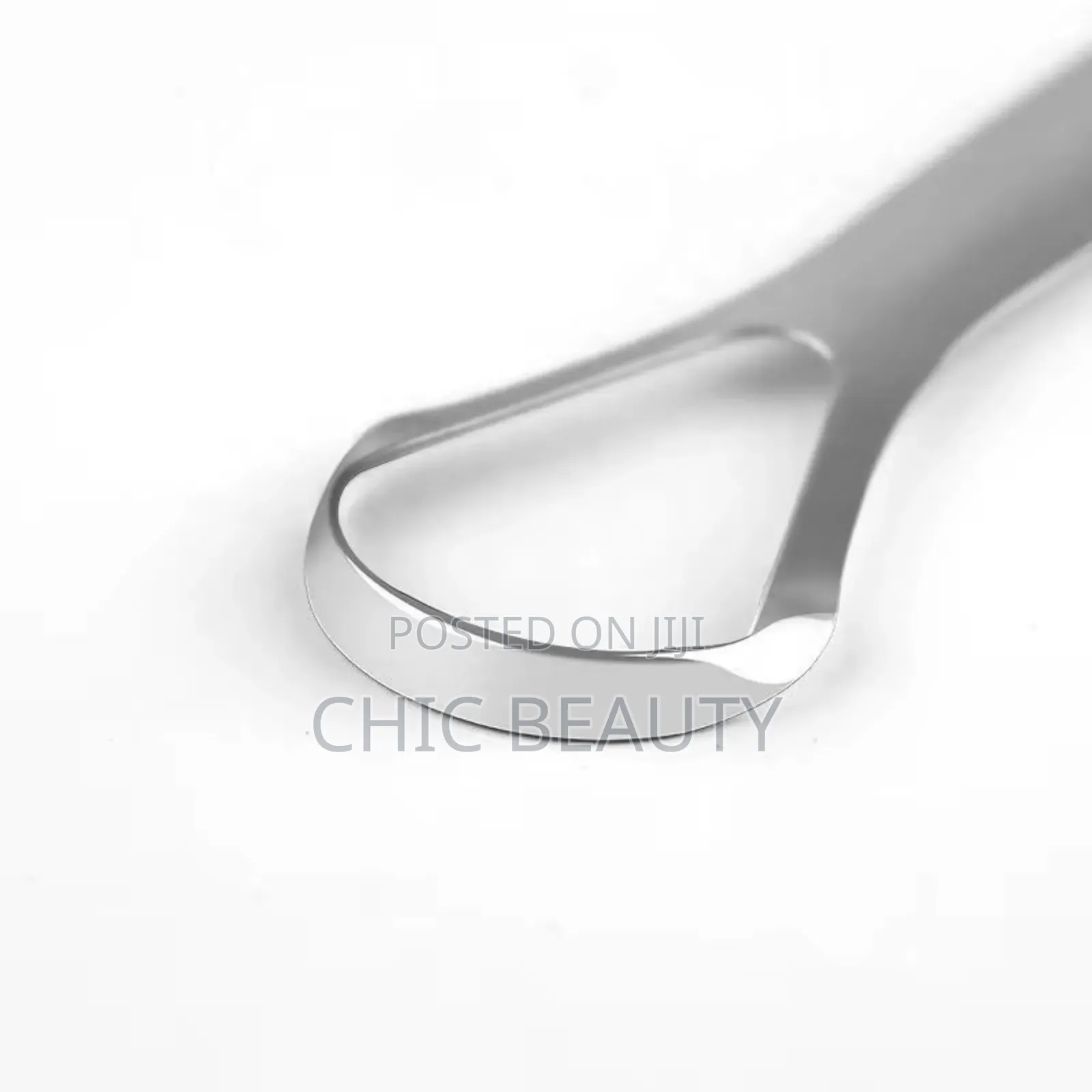 Stainless Steel Tongue Scraper. It Cleans Your Tongue