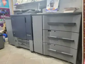 Konica C1060 Press - Reliable Printer for Media Companies.