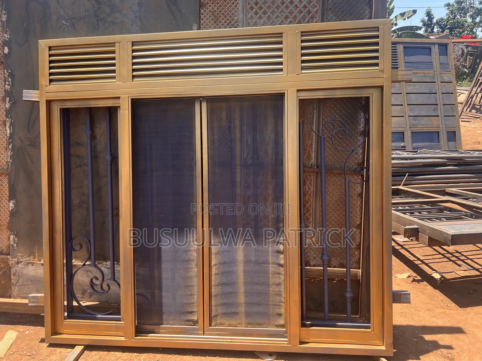 Golden Sliding Window at Busuulwa Metal Fabricions