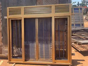 Golden Sliding Window at Busuulwa Metal Fabricions