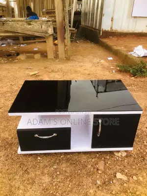 Center Table 58cm by 110cm With Black Glass