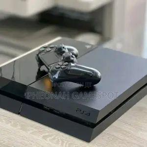 Ps4 Fat - Standard Edition. Comes With 2 Controllers and Over 12 Games