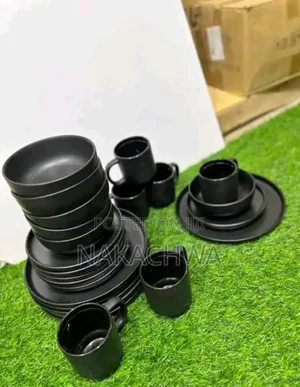 A Set of Black Dinner Set of 24 Pieces