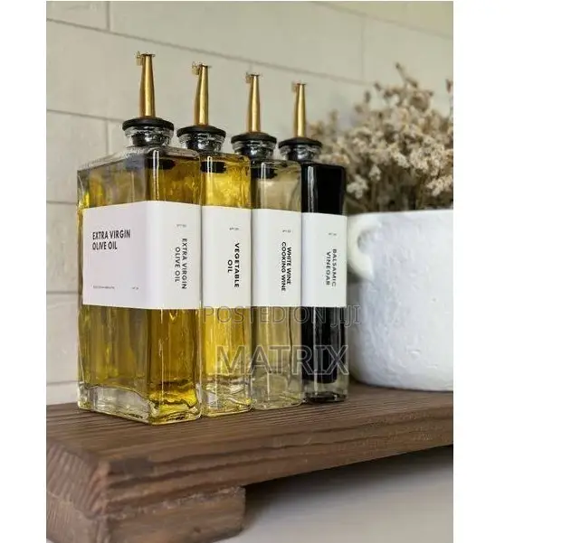 A Set of 4 Borosillicate Glass Oil Dispensers