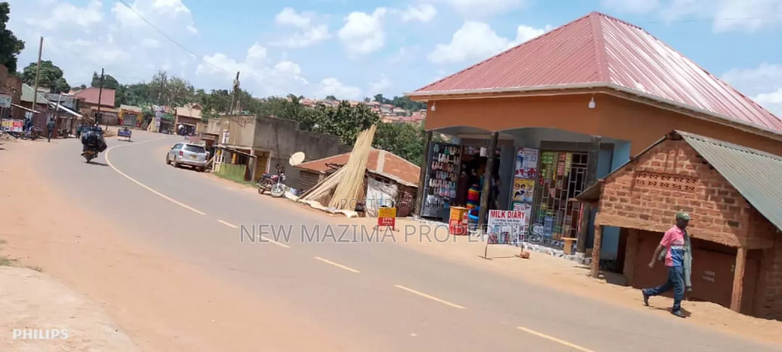 Very Busy Commercial Two Double Shops on Forced Sale Nansana Town