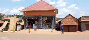 Very Busy Commercial Two Double Shops on Forced Sale Nansana Town