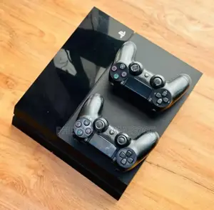 Playstation 4 (Ps4) With Two Controllers And 15 Free Games.