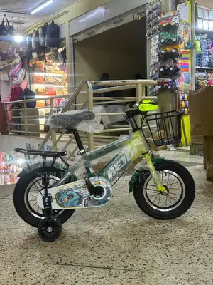 Green and Black Children’S Size 12 Bicycle