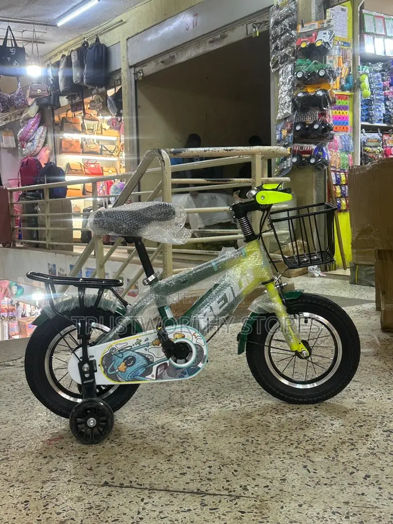 Green and Black Children’S Size 12 Bicycle
