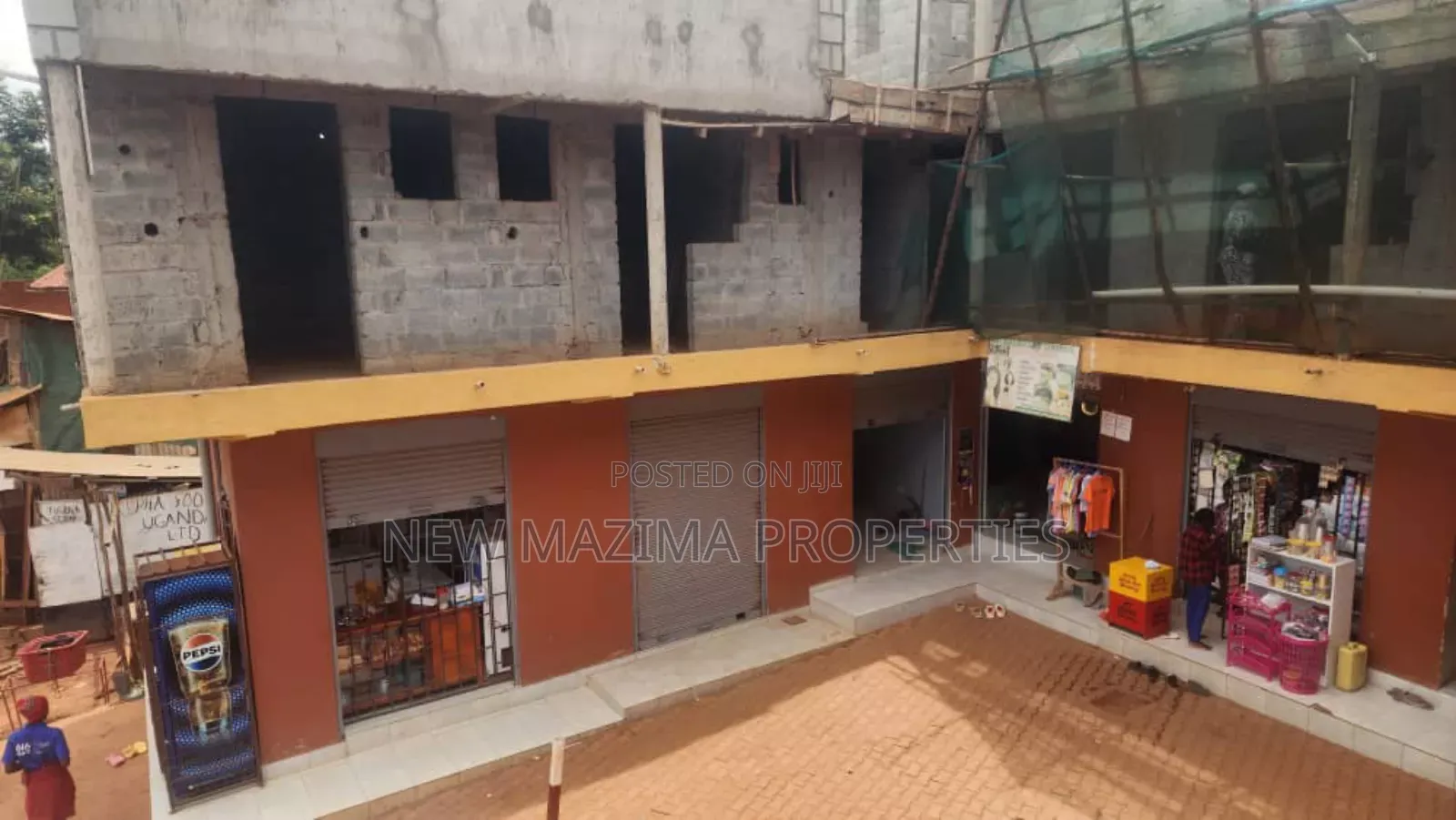 Commercia Plaza With Many Shops Selfcontained Rentals Onsale Kitende