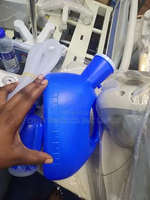 Male Urinal With A Hose