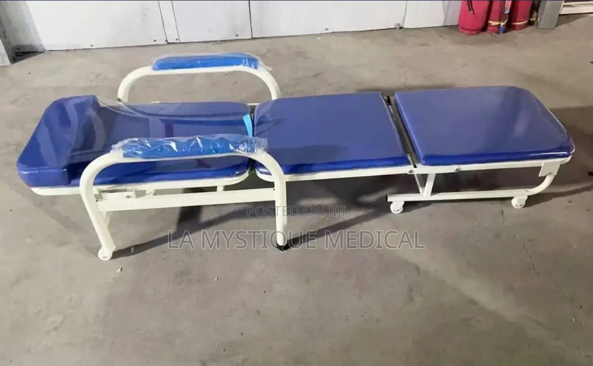 Patient Bed With a Bedside Locker and a Care Taker’S Chair