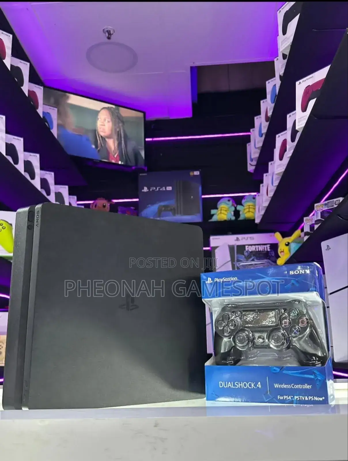 500gb Playstation 4 Slim. Chipped. 12 Games 2 Controllers. Almost New