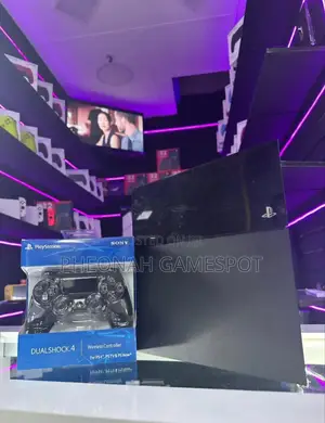 Standard Playstation 4 All Accessories Used and 10 Free Games, 2 Pads.