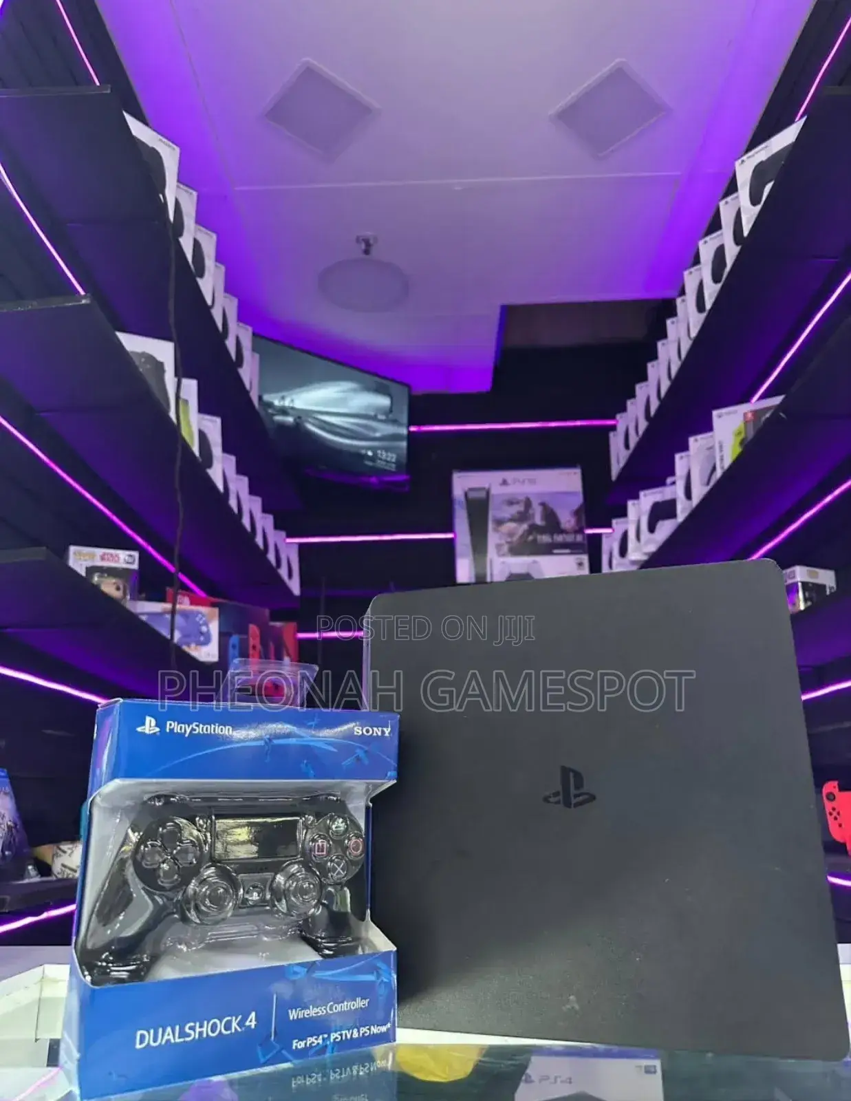 Sony Ps4 Slim Console - 500gb. It's Chipped With 11 Games and 2 Pads
