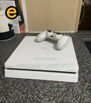 Playstation 4 Slim Ku Beeyi Layisi. Comes With 10 Free Games 2 Pads