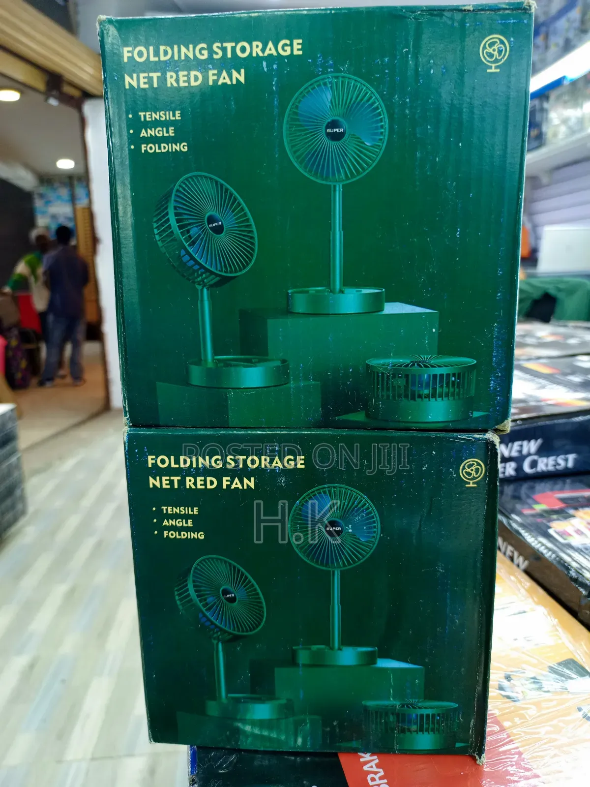Folding Storage Net Red Fan With a Mobile Phone Stent.