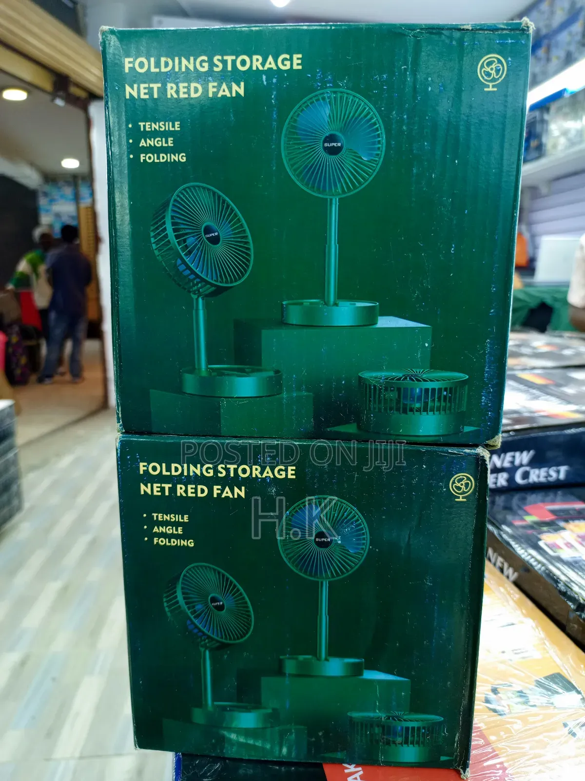 Folding Storage Net Red Fan With a Mobile Phone Stent.