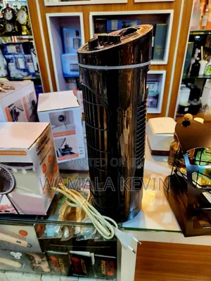 A Neo 14” 6 Speed Electric Desk Tower Fan.