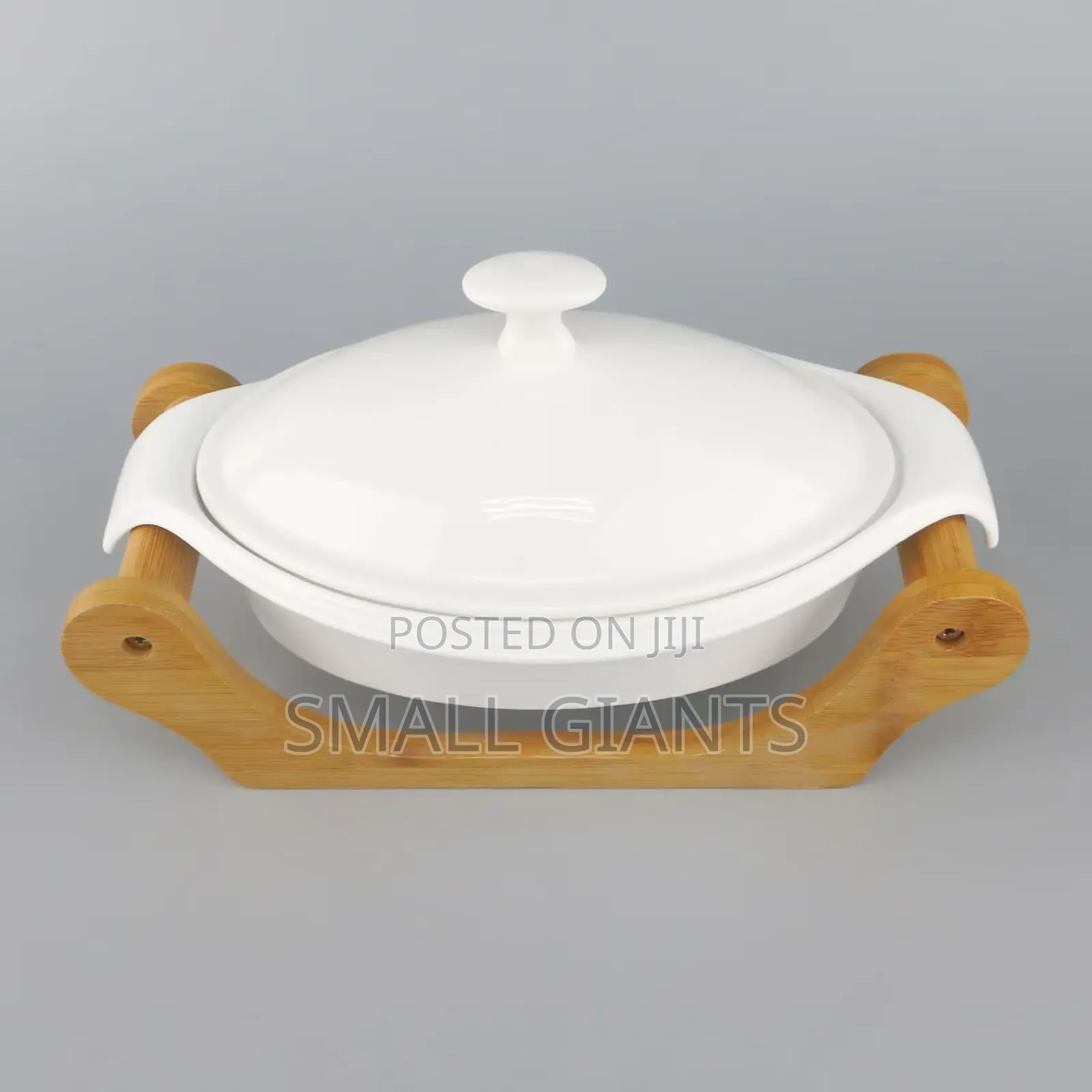 White Ceramic Casserole Dish With a Wooden Base