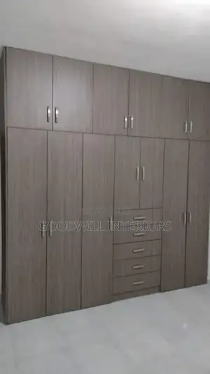 A Wardrobe With Storage Drawers