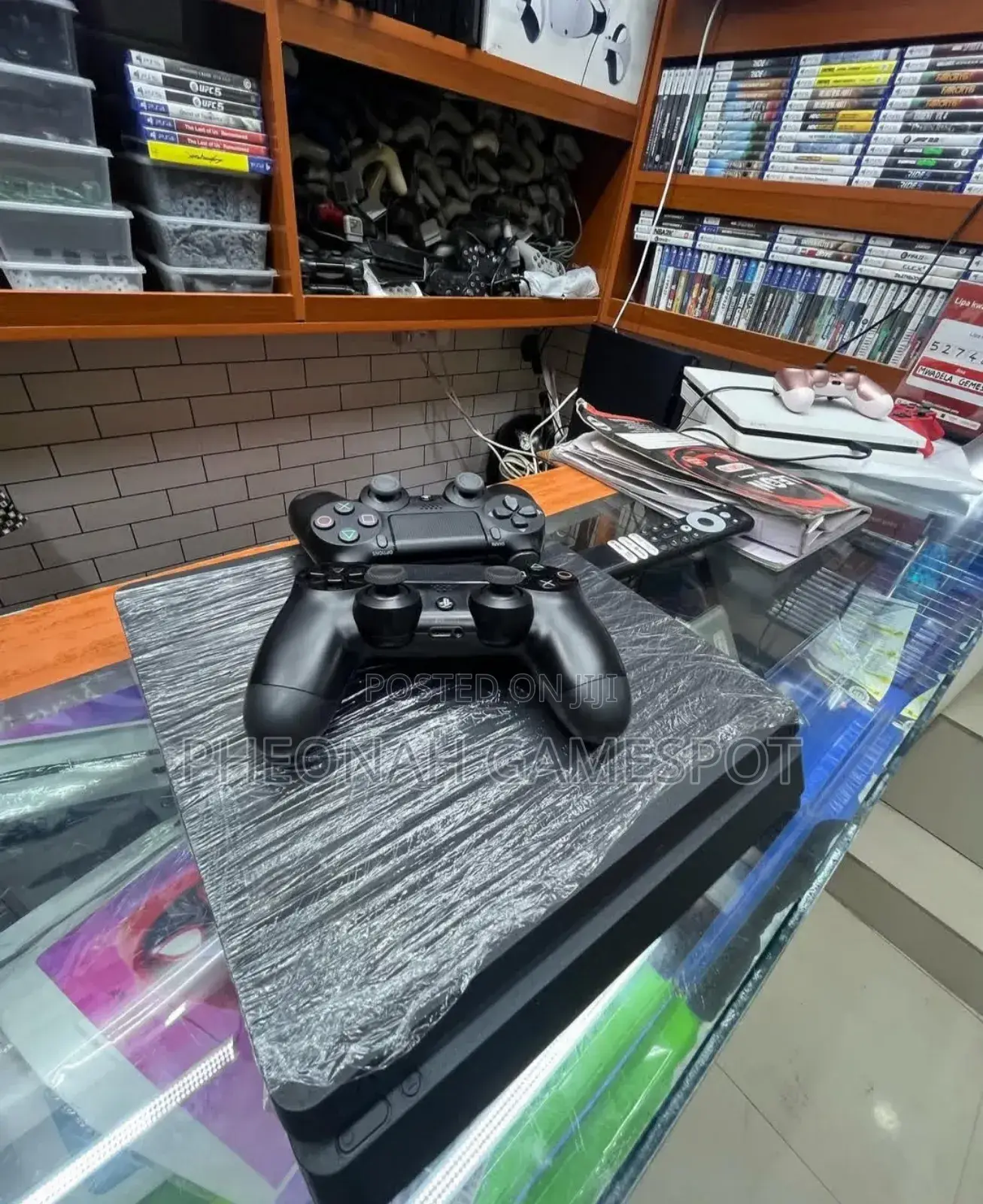 Chipped Ps4 Slim Console Great Condition. Comes With 12 Games 2 Pads