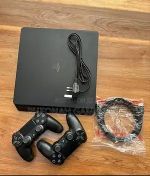 Ready to Play! Sony Playstation 4 Slim (Chipped). 11 Games and 2 Pads