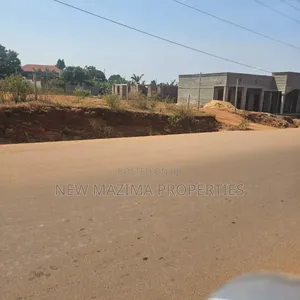 Commercial Plot Quicksale on Main of Kawuku Bwerenga Tarmac With Title