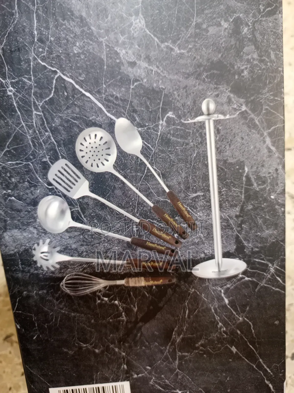 Durable Stainless Steel Kitchen Utensil Set With a Stand.