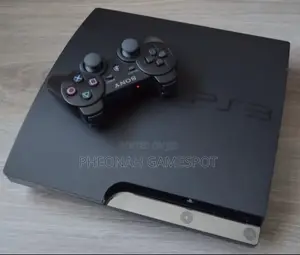 Playstation 3 Slim Full Package. With 15 Games and 2 Brand New Pads