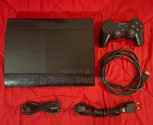 Neat Playstation 3 Super Slim. Comes With 25 Games and 2 Controllers