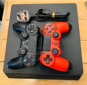 Playstation Four Slim. Comes With 11 Games and 2 Controllers. Perfect