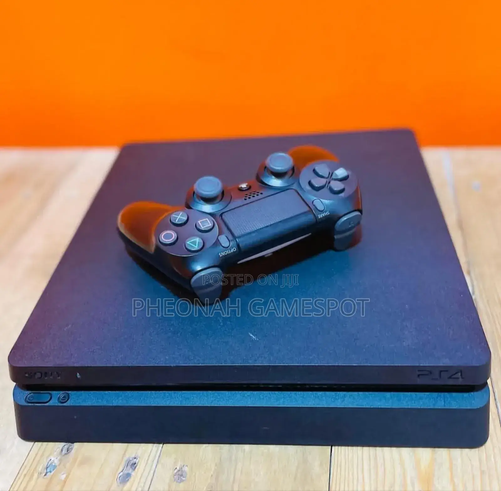 Buy This Playstation 4 Slim and 2 Controllers With All the Games.