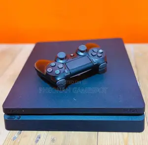 Buy This Playstation 4 Slim and 2 Controllers With All the Games.