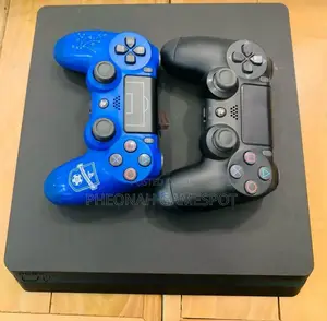 Ps4 Slim With 2 Controllers 10 Games. Ready to Play. Its Chipped