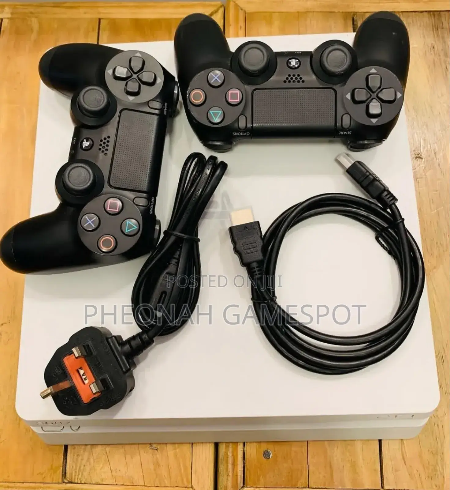 Ps4 Slim 2 Controllers, and a Stack of 10 Games for You.
