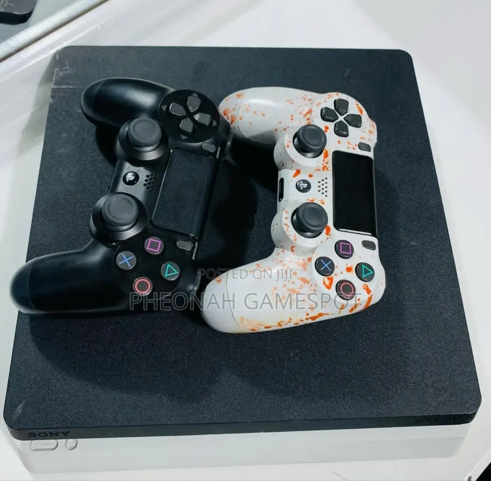 Ps4 Slim With 2 Controllers and 11 Games. Get Gaming Now.