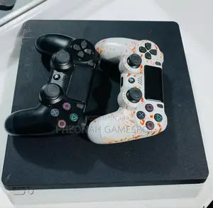 Ps4 Slim With 2 Controllers and 11 Games. Get Gaming Now.
