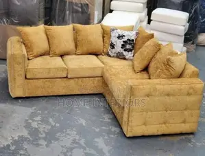 A Seater of Five People With Fabric Pillows