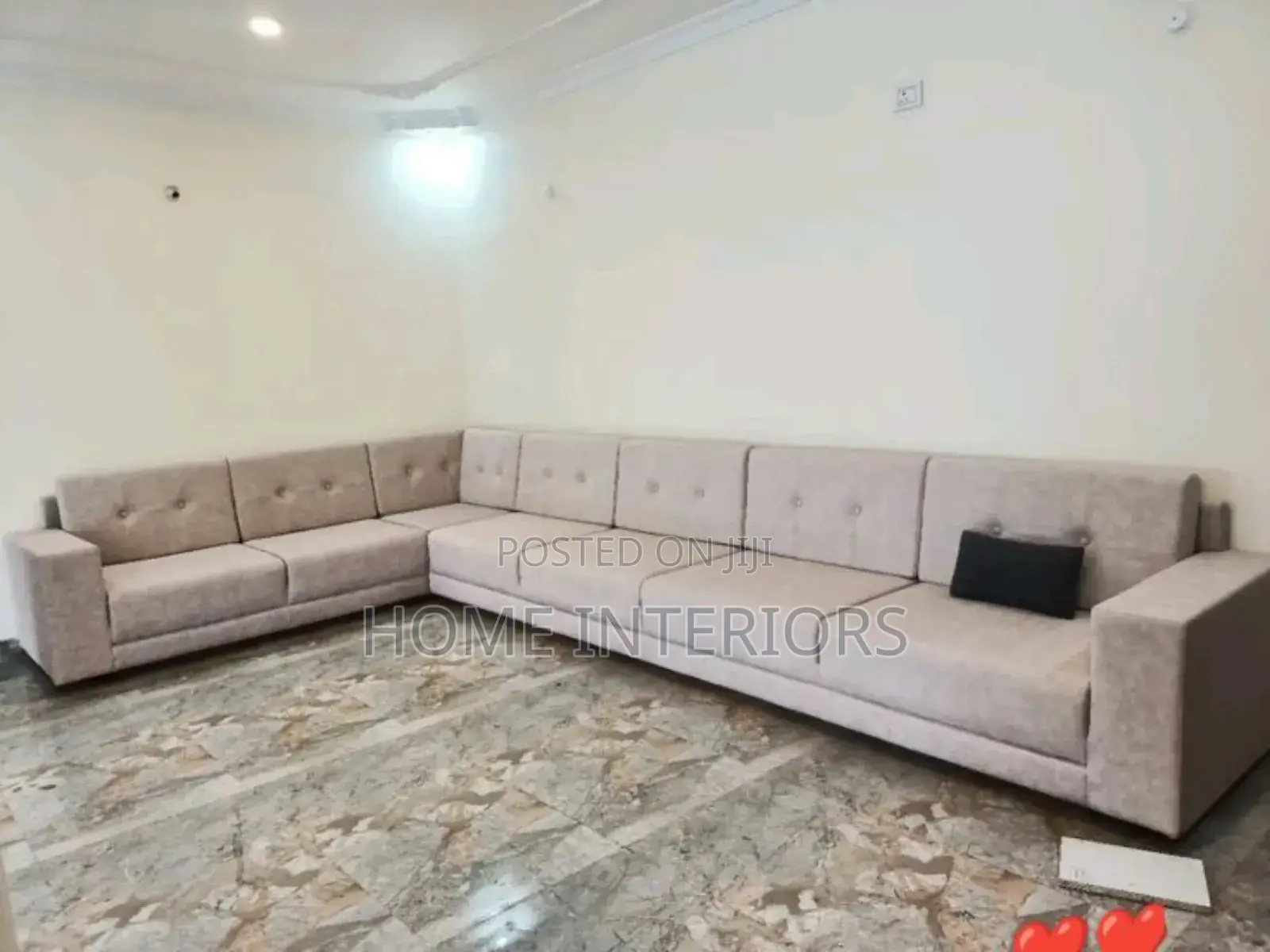 A Seater of Seven With Pillows