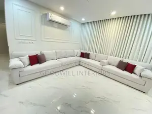 A Seater of Eleven With Fabric Pillows