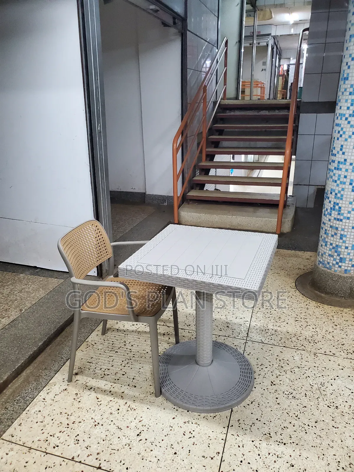 Considered Armed Plastic Chair and Table