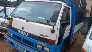 Isuzu Elf White and Blue Truck