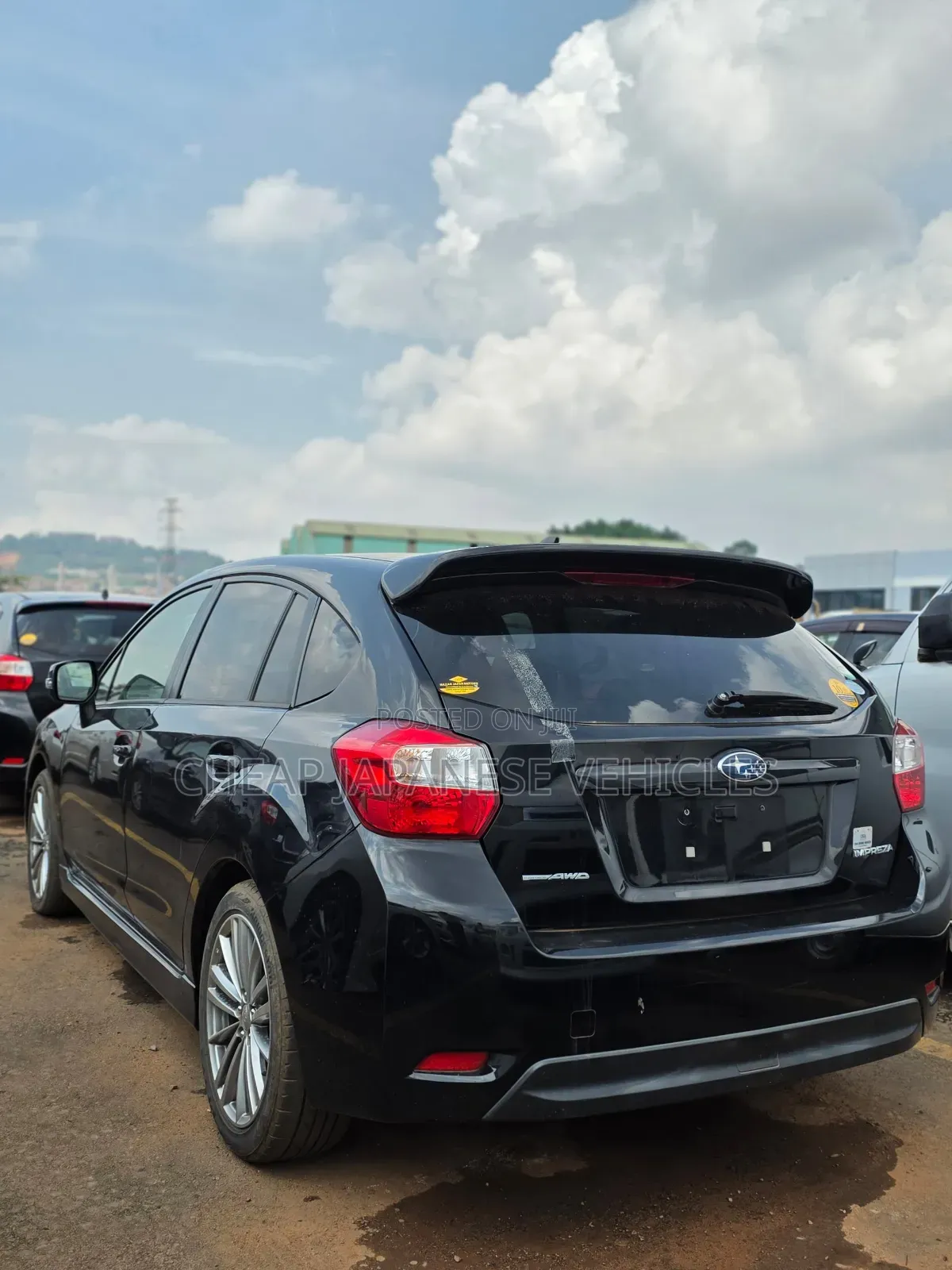 Subaru Impreza 2.0i Premium PZEV 4dr Hatchback AWD (2.0L 4cyl CVT) 2014