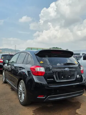 Subaru Impreza 2.0i Premium PZEV 4dr Hatchback AWD (2.0L 4cyl CVT) 2014