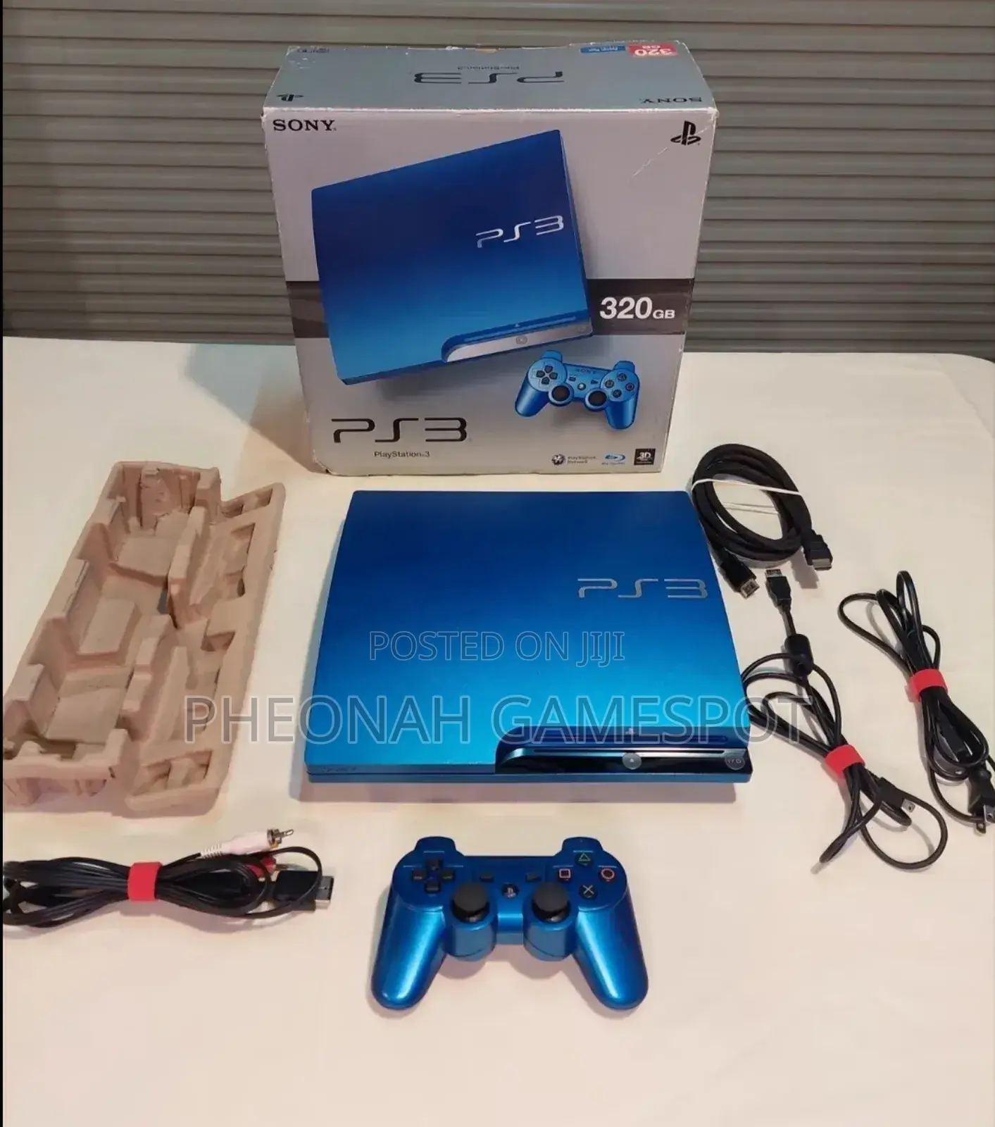 This Playstation 3 Slim Comes With 2 Pads and 12 Games. Mint Condition