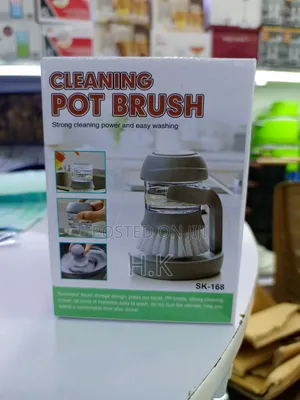 Cleaning Pot Brush With a Built-in Soap Dispenser.
