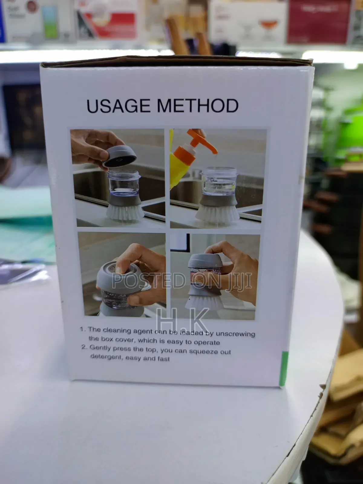 Cleaning Pot Brush With a Built-in Soap Dispenser.