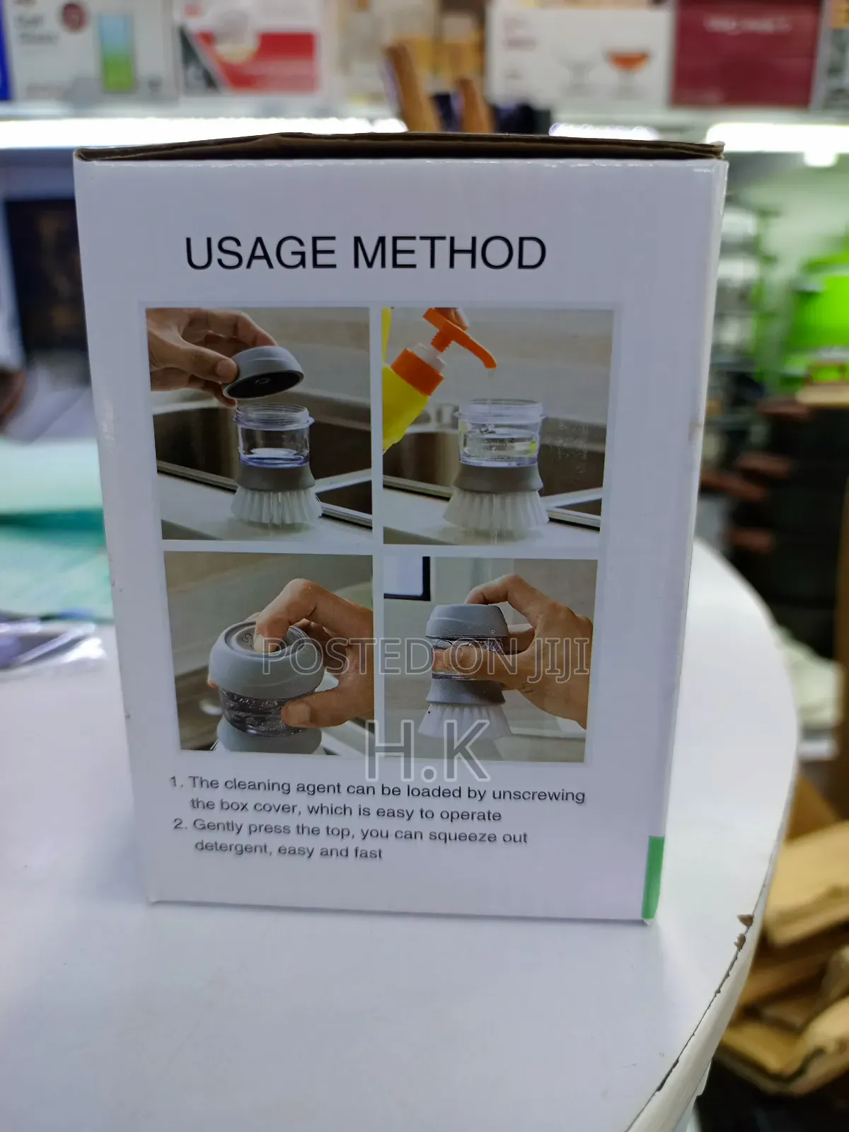 Cleaning Pot Brush With a Built-in Soap Dispenser.