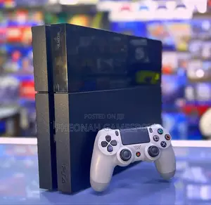 Amazing Used Ps4 Bundle: Console, Two Controllers, Thirteen Games!
